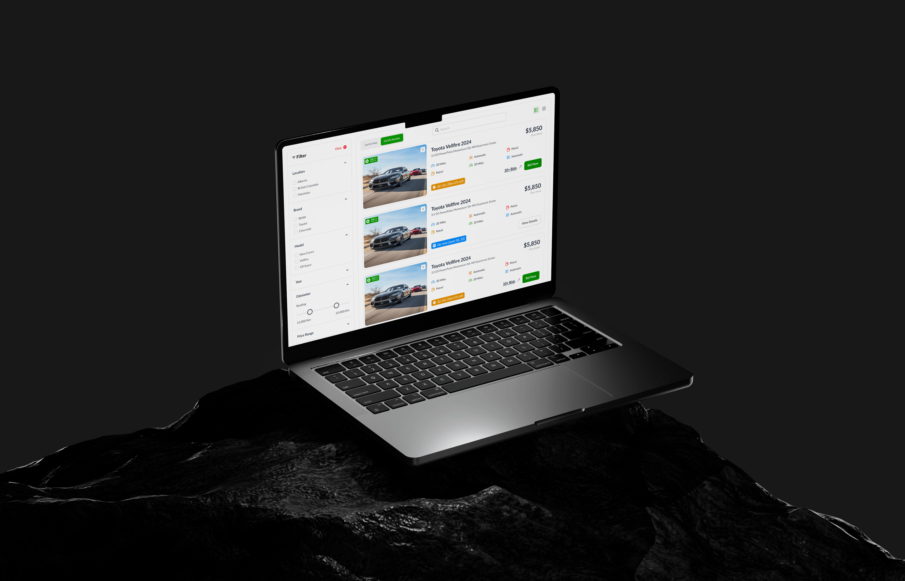 CarVU auction listings on a MacBook