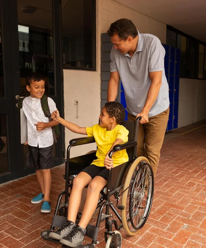 Father helping his children at school